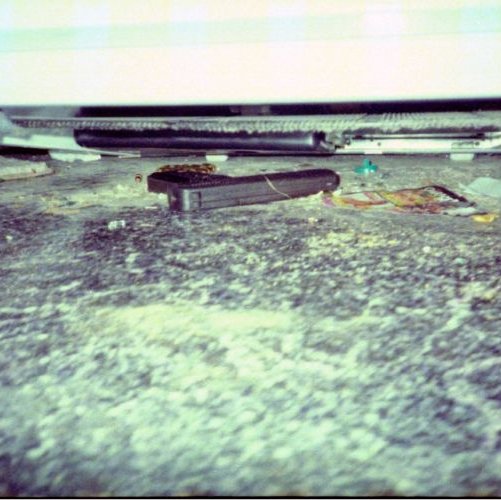 Hand-gun-underneath-fridge-thegem-gallery-metro